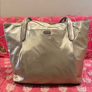 Tumi champagne tote bag